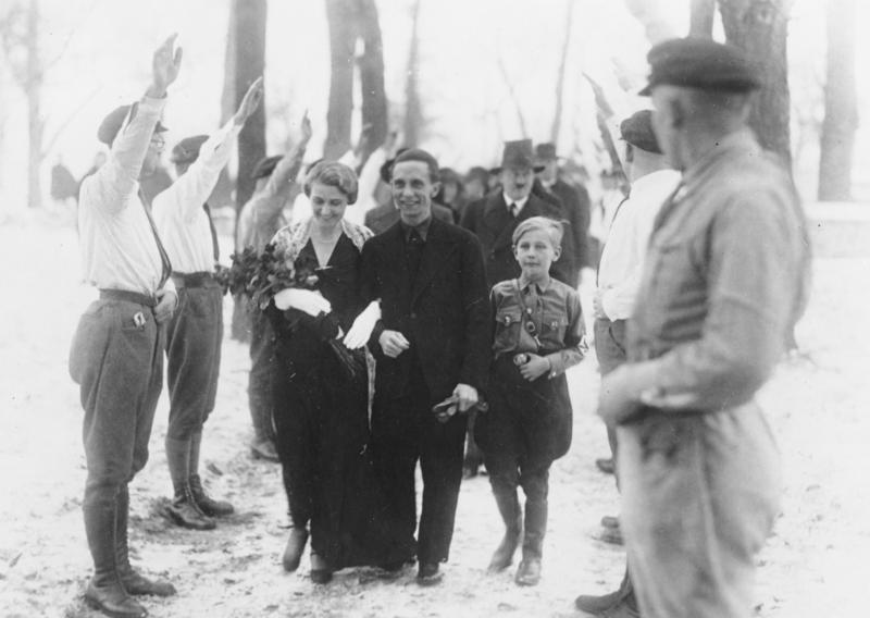 The wedding of Magda and Joseph Goebbels, Adolf Hitler in the back. December 1931. (Bundesarchiv, Bild 183-R32860 Creative Commons)