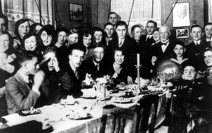 Hanukkah celebration in the synagogue, Geestemunda, Germany,1929 On the table the Shabbat candle sticks, and Hanukkah Lamp (Beth Hatefutsoth Photo archive, courtesy of Ilse Haas, Switzerland)