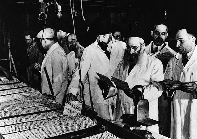 Baking Matzot for Passover under rabbinical supervision. New York, USA 1950s. (The Oster Visual Documentation Center, ANU - Museum of the Jewish People)