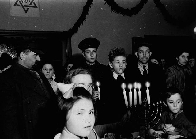 Hanukkah Celebration at the Bergen-Belsen DP Camp, Germany 1947. Photo: Grebenau, Tel Aviv. Beit Hatfutsot, the Oster Visual Documentation Center, courtesy of Sara Grebenau, Israel 